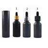 5ml Paper tube 10ml 15ml 20ml 30ml 50ml 100ml matte black essential oil serum glass dropper bottle with bamboo aluminum cap