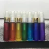 Wholesale travel use empty portable refill moulded glass vials 10ml rainbow colored glass spray bottle