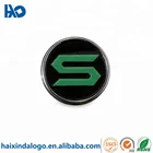 Custom painted and embossed metal plate logo self-adhesive label