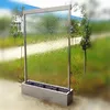 Artificial waterfall in clear glass panel with led light