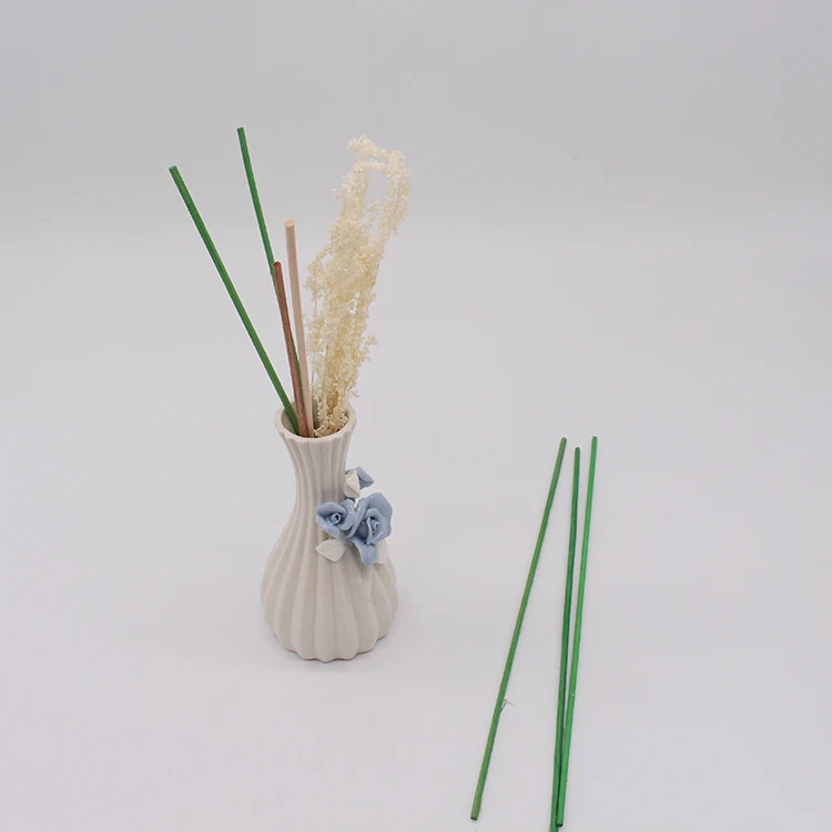 wholesale home fragrance reed diffuser with rattan stick and sola flower