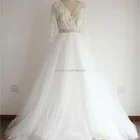Sheer Ivory Lace Tulle V Neck Long Sleeves Wedding Dress with Beaded Belt