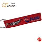China Cheap High Quality Wholesale Brand Logo Twill Fabric Key Tags Embroidery Keychains for Air Flight Safety