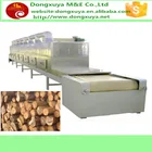 Large-scale Microwave machine used as wood sawdust dryer