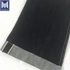 cheap price 100% cotton raw selvedge denim fabric stock lot for slim tapered beatle buster motorbike jeans