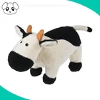 white and black walking plush animal toy cow stuffed cow that moos