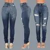 2018 cheap quality bulk jeans ladies private logo designer denim dresses China garments factory blue pants