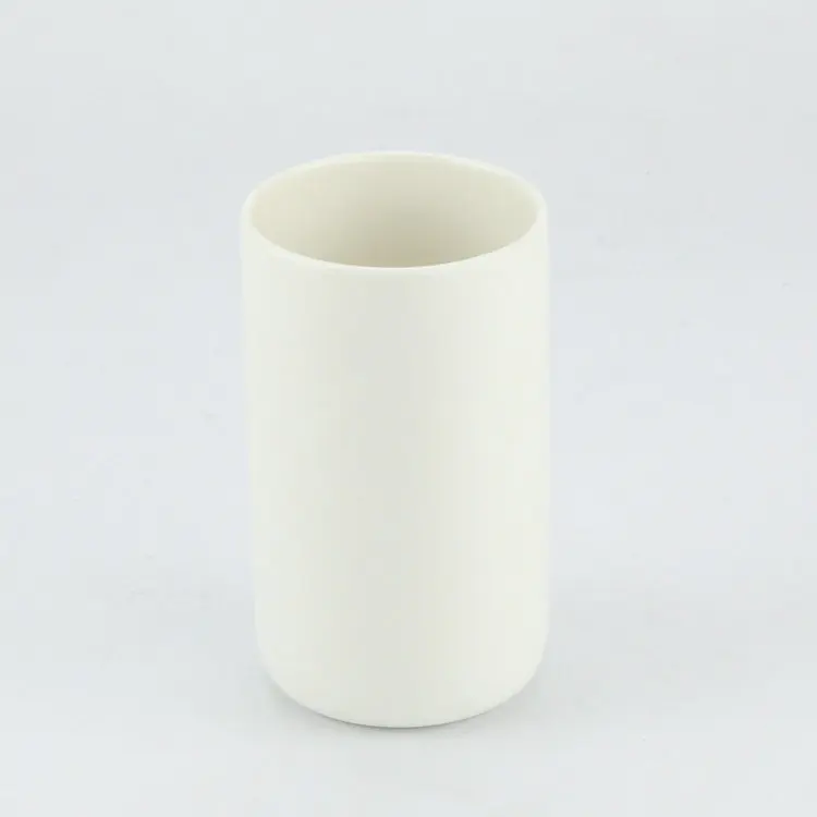 Frosted white unglazed differing sizes ceramic candle jar with lid.JPG