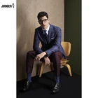custom made to measure trendy office wearing business suit for men with plaid patterns