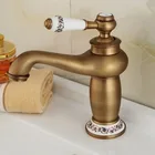 ornate single handle brass curved basin faucets