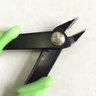 Green wire cutter and cable stripper tool