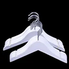 Factory custom LOGO metal stainless steel circle hooks wooden coat hanger for swimsuit display