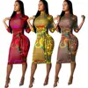 QM3545 Smooth fabrics and geometric patterns are tied to create sexy slim dresses