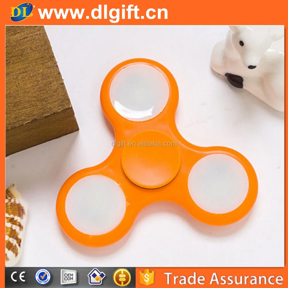 England best selling cheap plastic led light spinner toy for adult