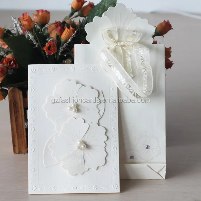 elegant white paper flower theme with handbag blank wedding