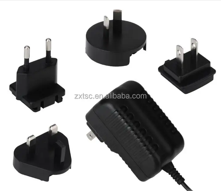 universal international travel adapter dc12v 1a/2a ac power