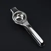 stainless steel lemon clamp An orange juice squeezer squeezes the juice Mini household orange works by hand