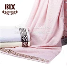China Wholesale Stock Woven Plain Color Jacquard Cotton Bath Towels