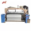 Textile weaving machine high speed air jet loom