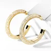 /product-detail/aep056-korean-fashion-wholesale-in-stock-gold-circle-cc-shape-diamond-hoop-earrings-for-women-62191840941.html