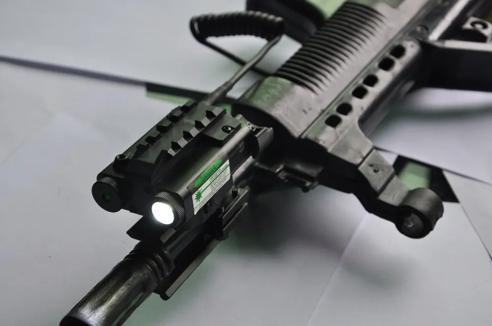 ES-FX103-LG tactical compact square led light with green laser mounted on weapon rail.JPG