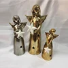 Indoor electroplated copper ceramic angel statue with heart porcelain angel
