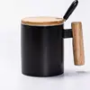 /product-detail/fashion-ceramic-mug-with-wooden-handle-ceramic-mug-with-lid-ceramic-gift-mug-62164493506.html