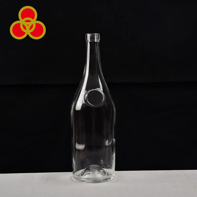 Claro botella de vidrio para botella de whisky 750 ML con logotipo redondo posición