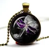 Steampunk dragon fly gears on moon moon with clock gears purple dragonfly necklace Glass Photo Cabochon Necklace