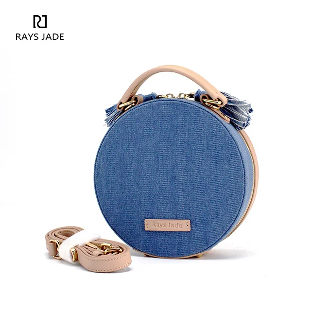 Designer cross-body bag made in denim with plain leather ladies handbags