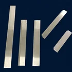 Tungsten carbide cutting blade for textile staple fiber