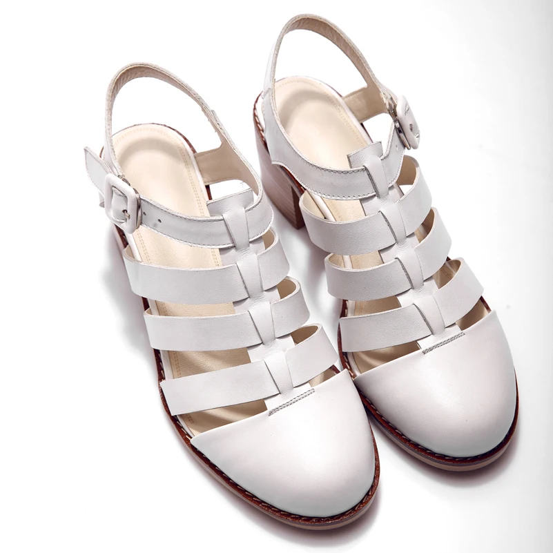 white medium heel shoes