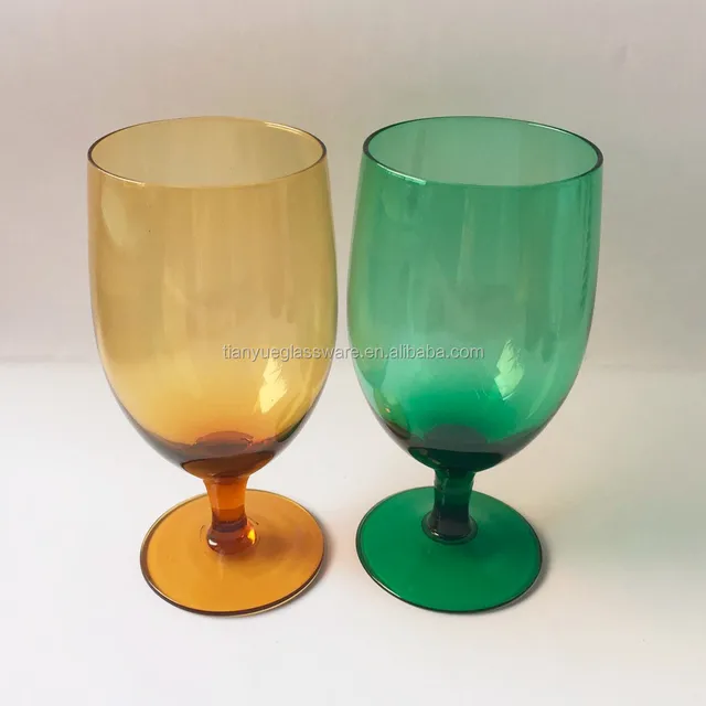 beautiful amber glass stemmed sherry glass, green wine glass