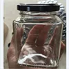 /product-detail/wholesale-all-kinds-of-different-size-glass-jam-jar-honey-jar-sealed-glass-jar-with-metal-lid-60603162411.html