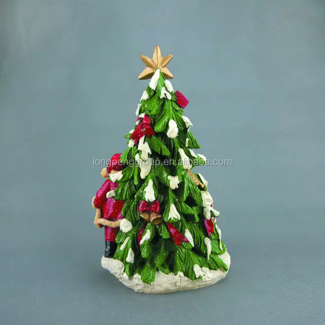 santa claus figurine with christmas tree, christmas decorations