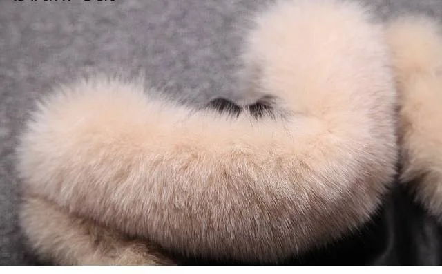 2014 the new explosion models in Europe and America big plush leather trim grass washed hooded sleeveless long vest