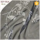 Printed crinkle georgette silk fabric of elegant dresses for women