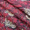 Telas de Tongxiang stock textile wholesale tiger pattern 100%polyester jacquard T/C fabric