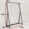 Metal and wood floor shelf display for hanging clothes