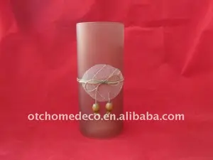tall glass candle holders with gift tie
