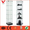 Glass tower display case with hinged door for digital camera store design