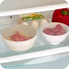 Ultra Stretchy Silicone Super Stretch Lids to keep food fresh. Locks in freshness air tight - Adjusts to shape and size of con