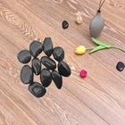 Cheap black river rocks cobblestones decoration use for sale