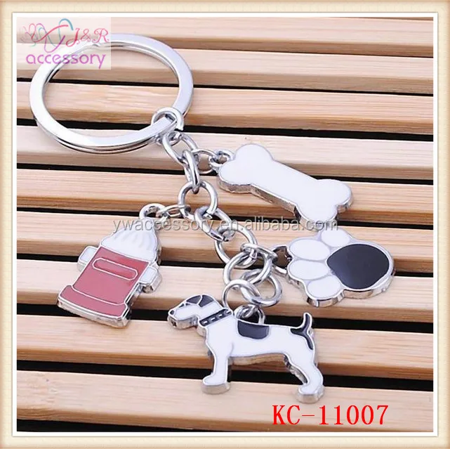 Fashion lovely pet dog shaped alloy key chain with bone shaped pendant Fashion lovely pet dog shaped alloy key chain with bone shaped pendant