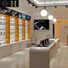 New showcase mobile shop interior design picture for phone accessories sale