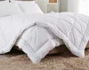 Luxury down alternative comforter provides medium warmth for year-round comfort