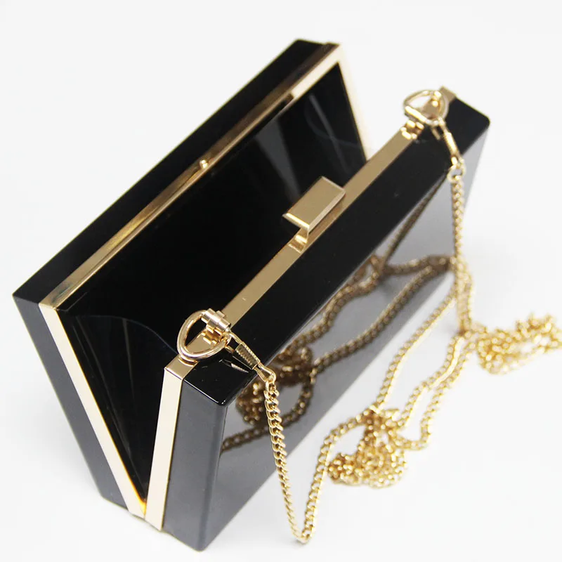 black clutch bag with gold chain