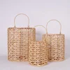 Rattan candle lantern with glass