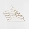 Factory directly decorative fashion ins hot selling set of 5 aluminum wire gold clothes coat hanger for home