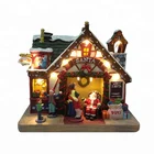 Polyresin decor sitting santa scene lighthouse Christmas village